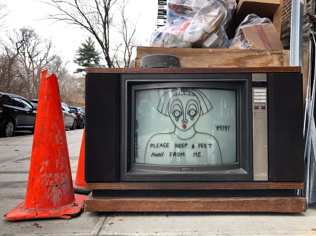 A photo of a TV reading "please keep 6 feet away from me" in Prospect Lefferts Gardens